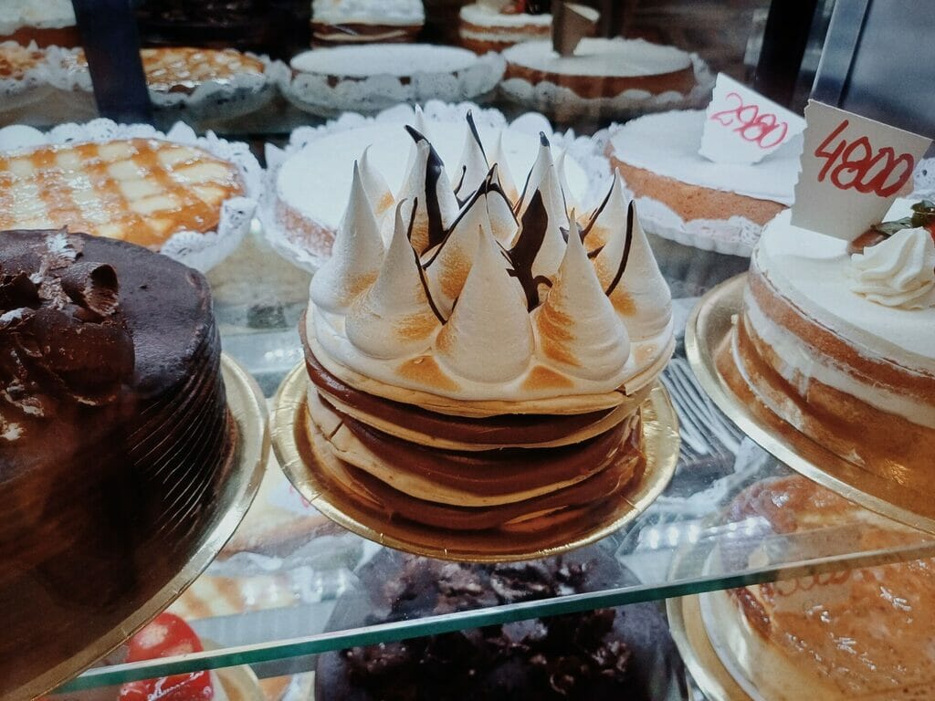 Small rogel cake on display at a bakery.