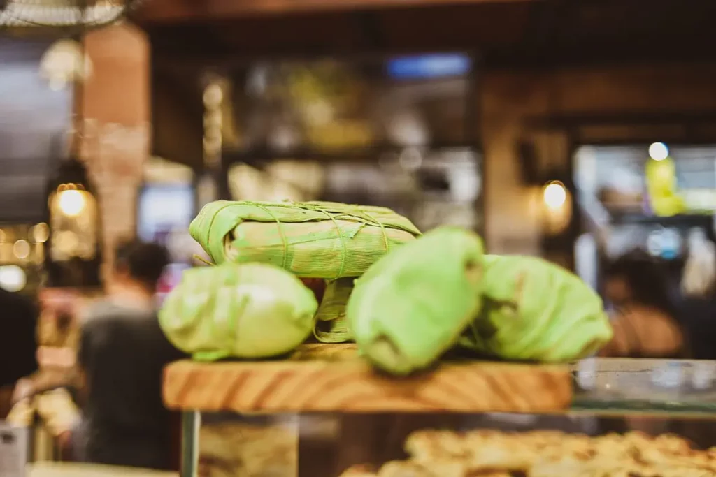 Tamales wrapped in corn corn husk.