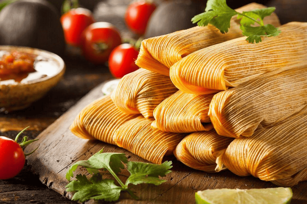 Corn dough wrapped around a filling and steamed